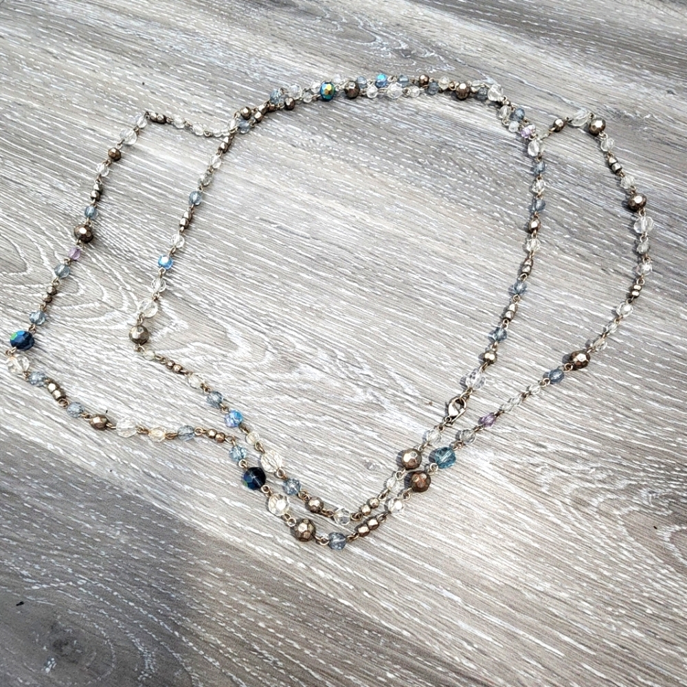 Elegant Silver and Blue Beaded Necklace Twist Closure